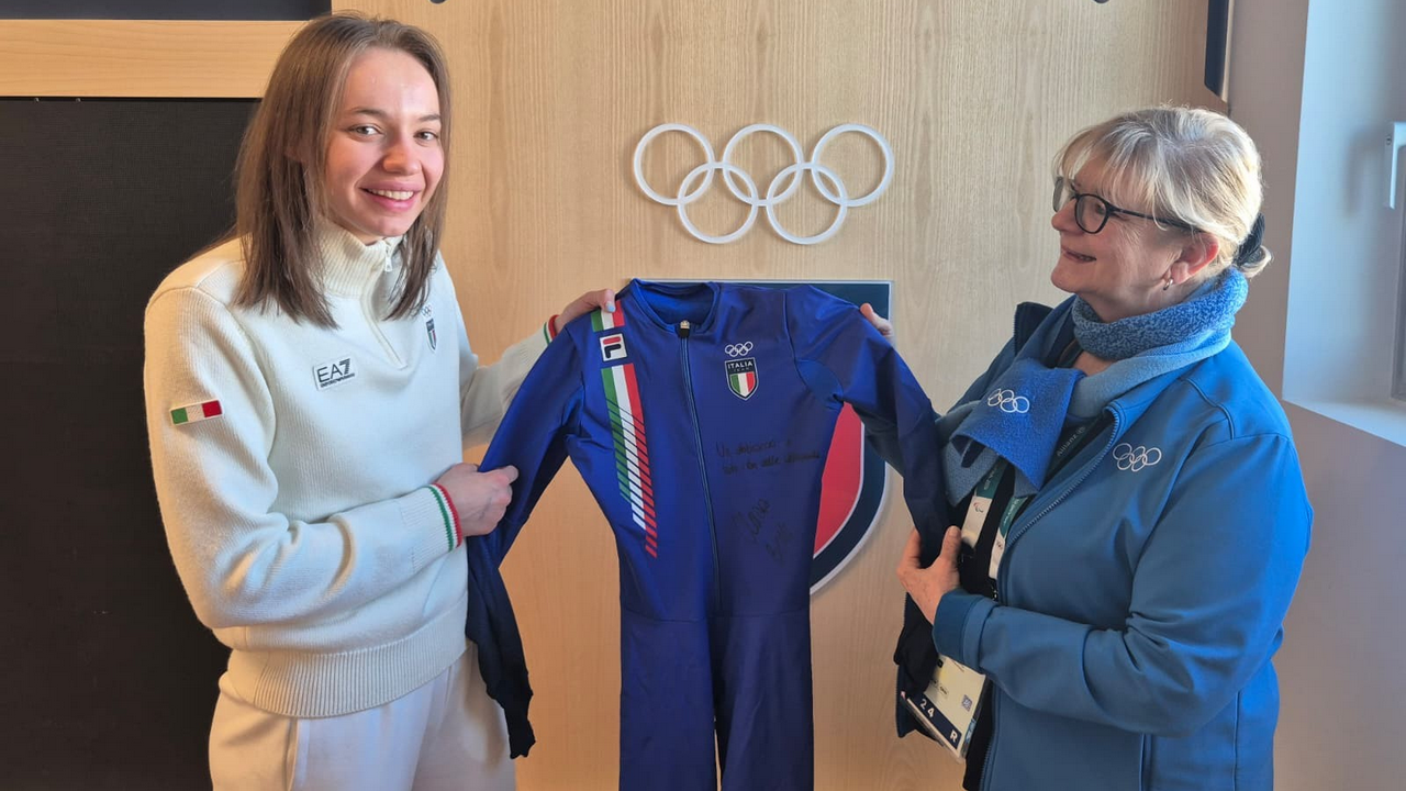 The suits of Francesca Lollobrigida, Arianna Fontana and Chiara Betti enter the Olympic Museum in Lausanne