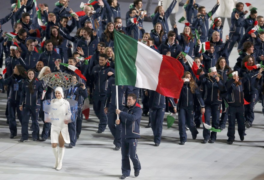 Zoeggeler, Italian tricolor pride in Sochi. Italian PM Enrico Letta greets the Azzurri parade